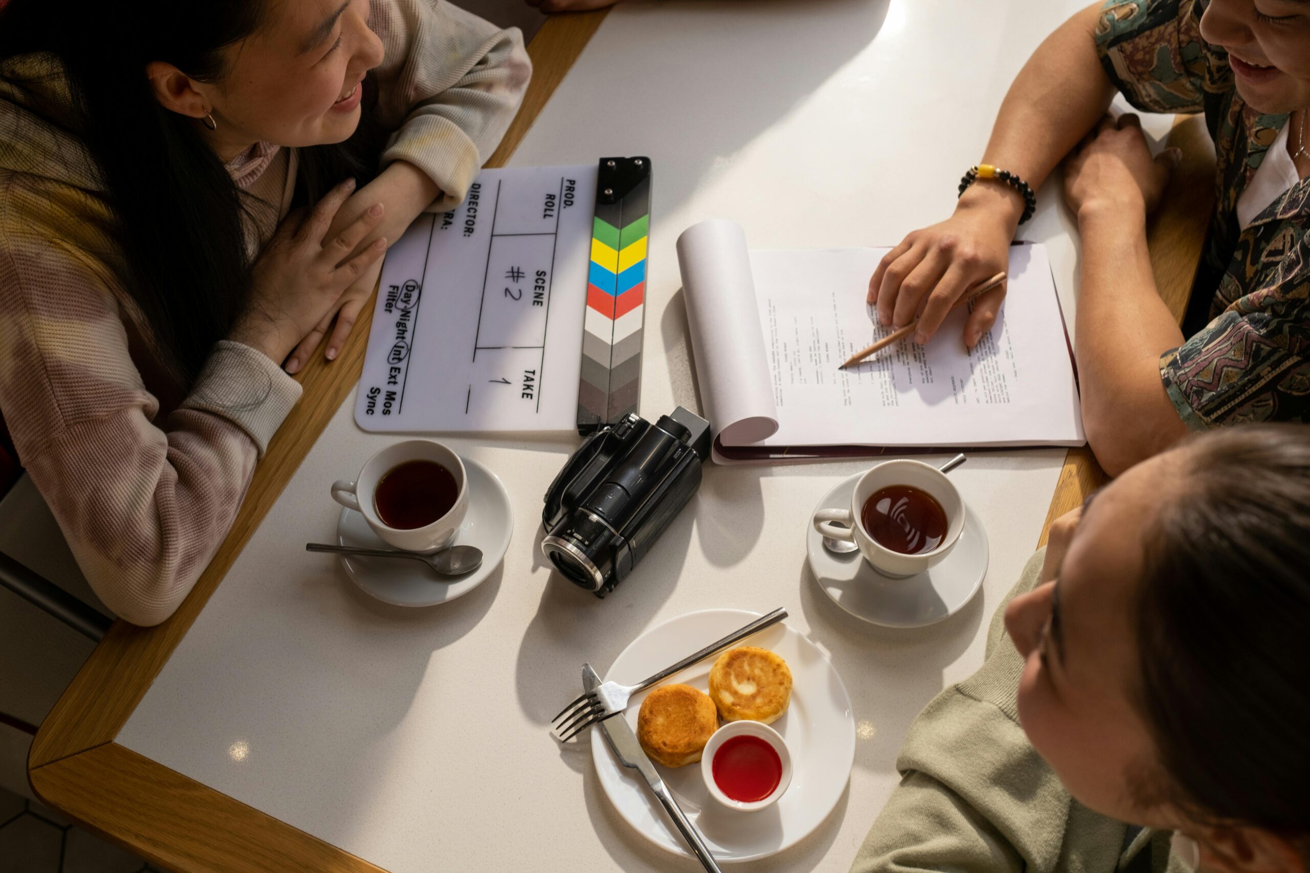 Planning a business video script over coffee