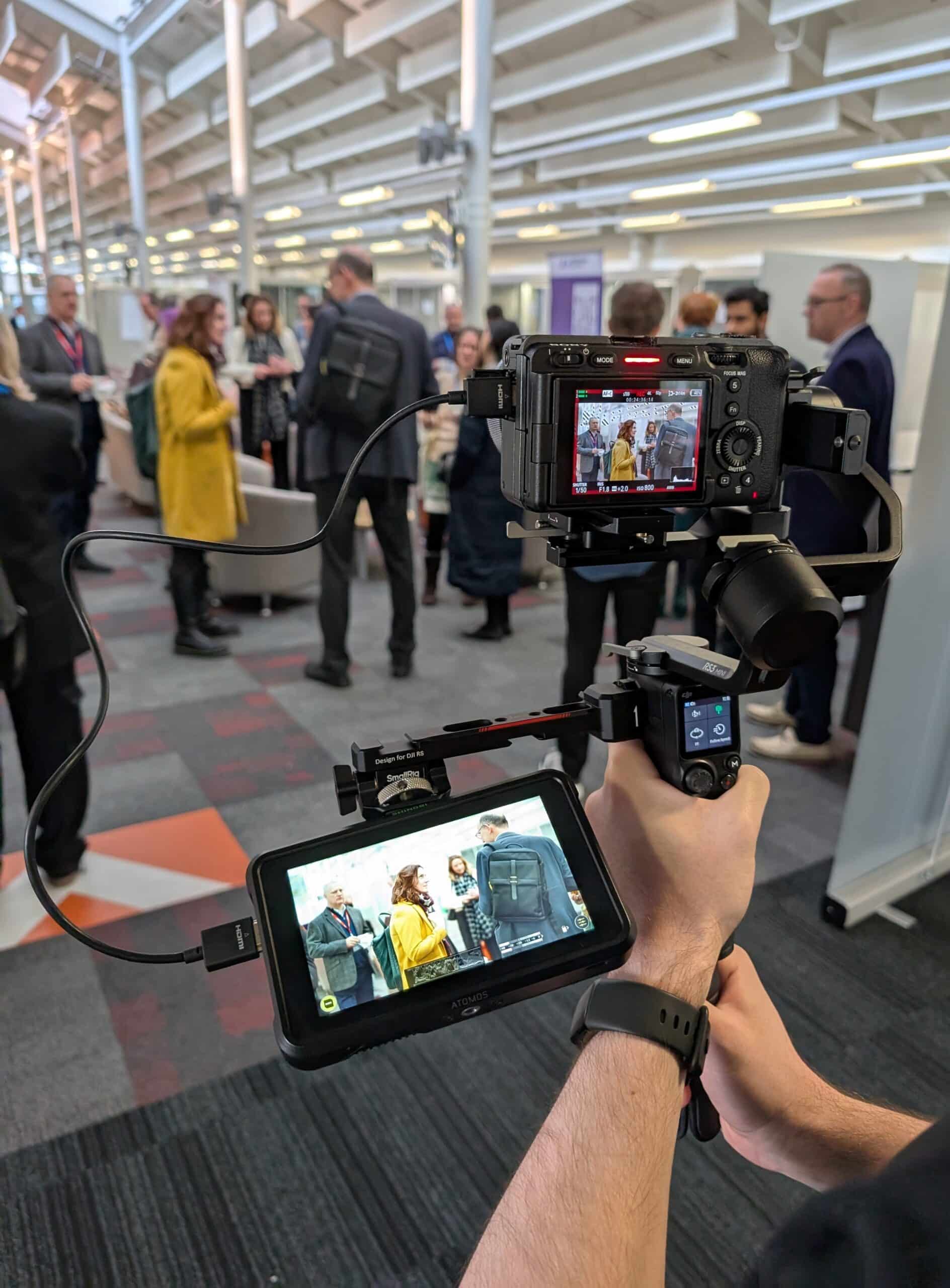 CMA Video camera operator filming a business event in Birmingham