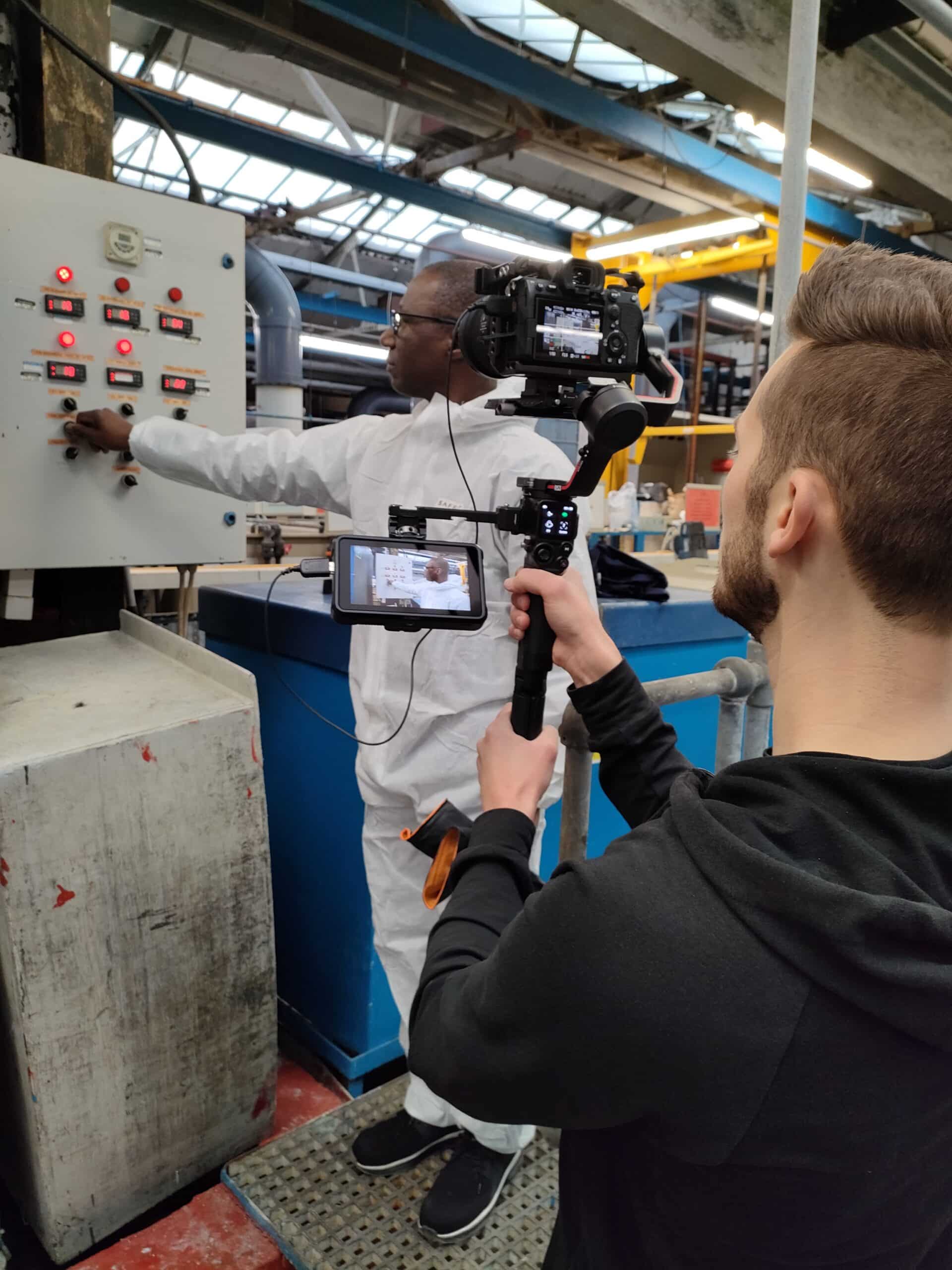 CMA Video camera operator filming an industrial training demonstration